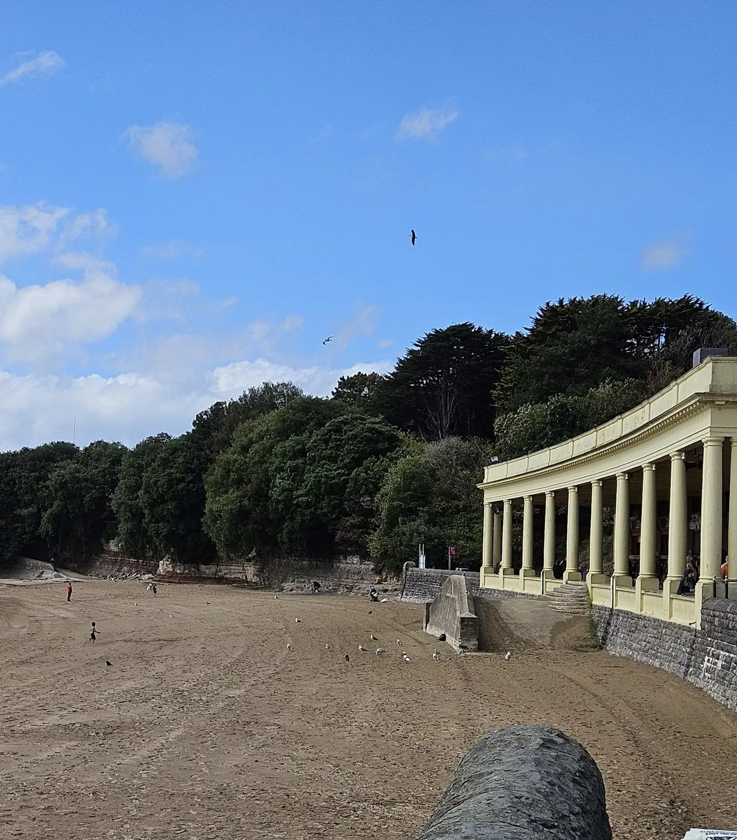 The Eastern Shelter colonnade above the sand at Whitmore Bay, Barry Island
